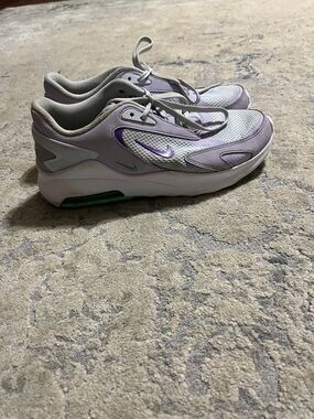 Nike Women’s Lavender and White Athletic Sneakers with Green Accents